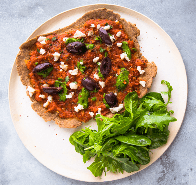 Embrace your cravings with plant-based cheesy pizza. 